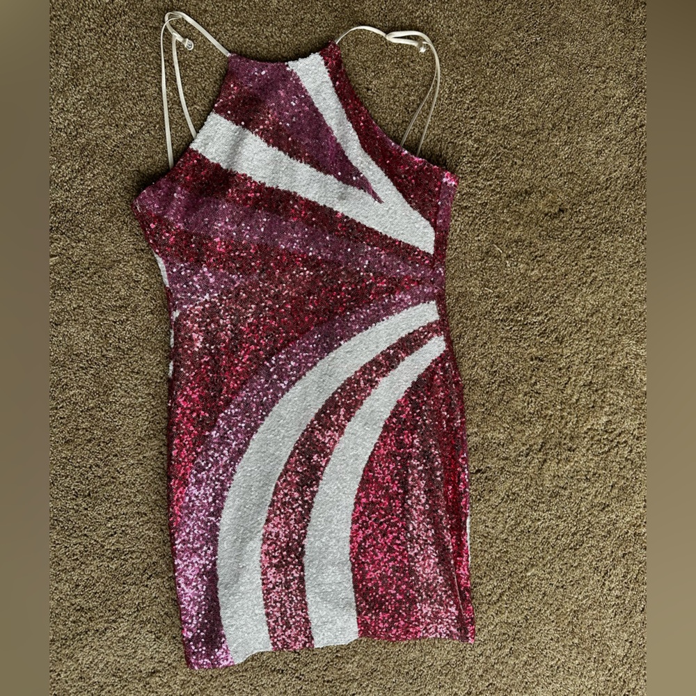 Pink mini sequins dress.